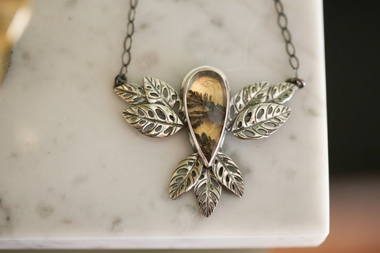Golden Glow Monstera Adansonii Necklace