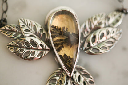 Golden Glow Monstera Adansonii Necklace