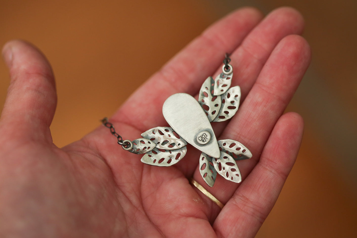 Golden Glow Monstera Adansonii Necklace